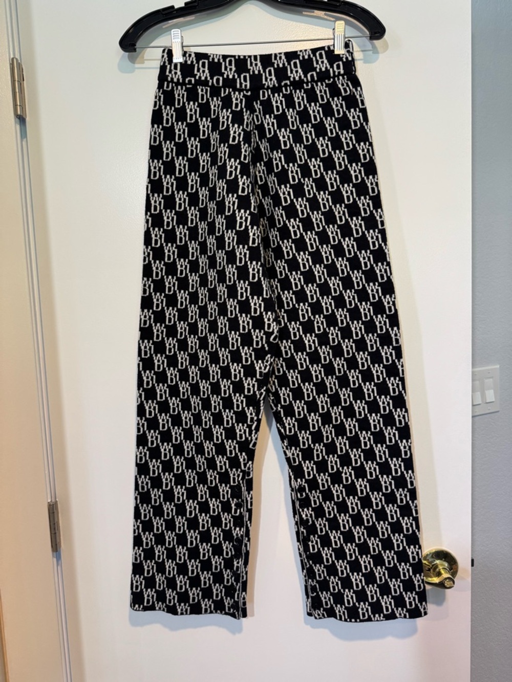 WE11DONE Black & White Monogram Knit Pants - Button Hem